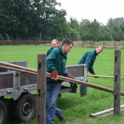 Man installs wooden fences