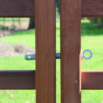 Anti-theft gate bolt between 2 wooden gates