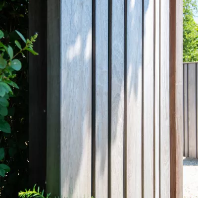 An opened wooden swing gate