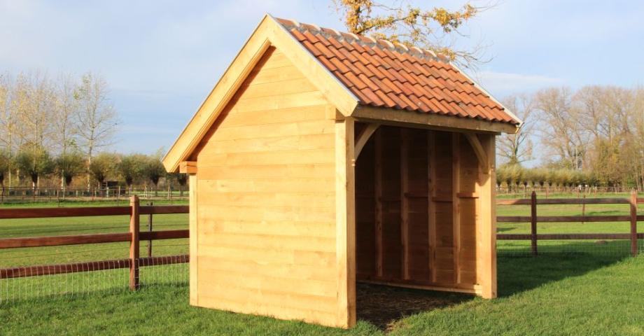 A wooden shelter for small outdoor animals
